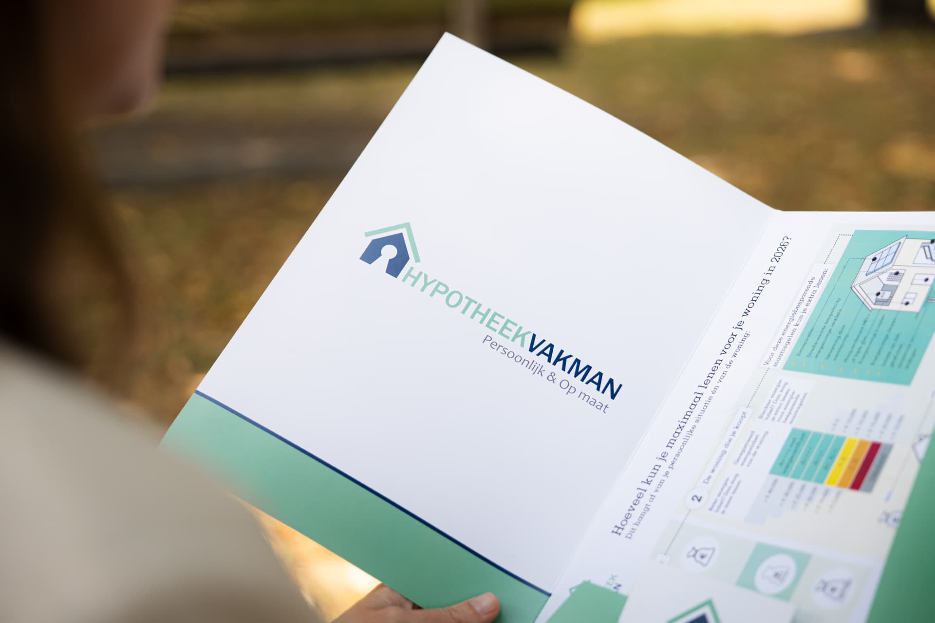 Opengeslagen brochure van HypotheekVakman
